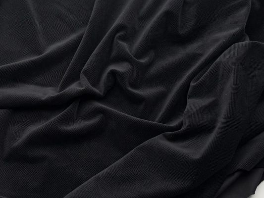 Mikro elastyczny aksamitny poliester. Idealny na sukienki.